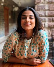Delightful Actress Meenakshi Chaudhary in a Cream Floral Print Kurta Photos 02