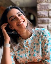 Delightful Actress Meenakshi Chaudhary in a Cream Floral Print Kurta Photos 03