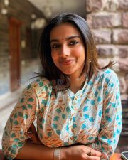 Delightful Actress Meenakshi Chaudhary in a Cream Floral Print Kurta Photos 04