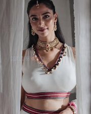 Elegant Actress Meenakshi Chaudhary in a White Embroidered Blouse Photos 01