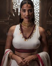 Elegant Actress Meenakshi Chaudhary in a White Embroidered Blouse Photos 05