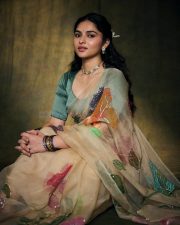 Enchanting Actress Kayadu Lohar in a Cream Floral Organza Saree with Teal Blouse Photos 07