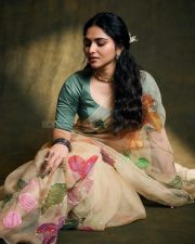 Enchanting Actress Kayadu Lohar in a Cream Floral Organza Saree with Teal Blouse Photos 08