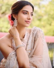 Flawless Meenakshi Chaudhary in a Blush Pink Embroidered Lehenga Pictures 03