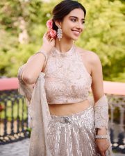 Flawless Meenakshi Chaudhary in a Blush Pink Embroidered Lehenga Pictures 05