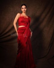 Glamorous Meenakshi Chaudhary in a Red Satin Lehenga Saree with a Embroidered Sheer Net Round Neck Photos 05