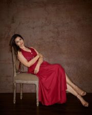 Gorgeous Indian Actress and Fashion Model Meenakshi Chaudhary in a Maroon Halter Neck Gown with a High Thigh Slit Pictures 08