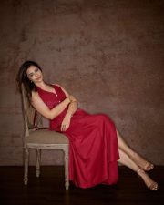 Gorgeous Indian Actress and Fashion Model Meenakshi Chaudhary in a Maroon Halter Neck Gown with a High Thigh Slit Pictures 08