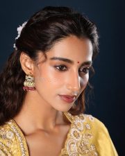 Gorgeous Meenakshi Chaudhary in a Yellow Saree with Yellow Embroidered Blouse with Floral Patterns Photos 01