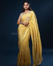 Gorgeous Meenakshi Chaudhary in a Yellow Saree with Yellow Embroidered Blouse with Floral Patterns Photos 05