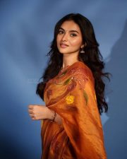 Heroine Kayadu Lohar in a Transparent Mustard Floral Saree with a Black Sleeveless Blouse Photos 04