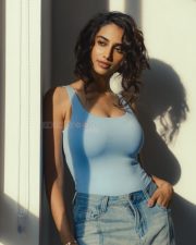 Hot Sensation Meenakshi Chaudhary in a Light Blue Tank Top and Jeans Photos 05