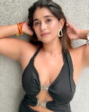 Indian Television Actress Chandni Bhagwanani in a Black Halter Neck Mini Dress with Cleavage Cutouts Photos 02