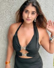 Indian Television Actress Chandni Bhagwanani in a Black Halter Neck Mini Dress with Cleavage Cutouts Photos 04