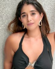 Indian Television Actress Chandni Bhagwanani in a Black Halter Neck Mini Dress with Cleavage Cutouts Photos 06