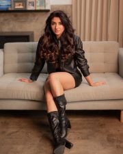 Jailer 2 Actress Mirnaa Menon Hot in an All Black Faux Leather Outfit with a Button Up Shirt over a Brown Bralette and Mini Skirt Photos 03