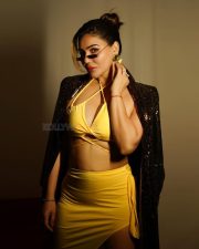 Let s Play Blind Har Chaal Ek Dhokha Actress Kangna Sharma in a Bold Yellow Wrap Bralette Top with a Matching High Waisted Yellow Maxi Skirt and Sequined Blazer Photos 01