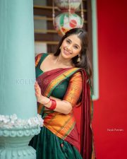 Radiant Actress Chandni Bhagwanani in a Green Maroon Traditional Saree Photos 01