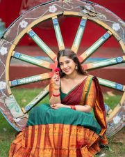 Radiant Actress Chandni Bhagwanani in a Green Maroon Traditional Saree Photos 02