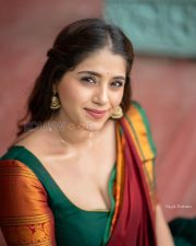 Radiant Actress Chandni Bhagwanani in a Green Maroon Traditional Saree Photos 03