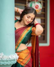 Radiant Actress Chandni Bhagwanani in a Green Maroon Traditional Saree Photos 05