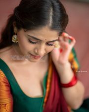 Radiant Actress Chandni Bhagwanani in a Green Maroon Traditional Saree Photos 09