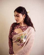 Radiant Actress Kayadu Lohar in a Cream Floral Embroidered Saree Photos 02