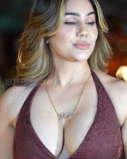 Seductive Kangana Sharma Cleavage in a Brown Satin Corset Mini Dress Photos 02