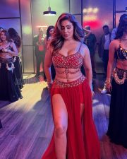 Seductive Kangna Sharma Cleavage in a Red Embellished Bra and Slit Skirt Photos 01