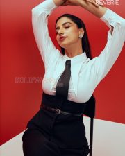 Striking Actress Meenakshi Chaudhary in a White puff shoulder blouse with black necktie waistcoat and wide leg trousers Photos 02 Striking Actress Meenakshi Chaudhary in a White puff shoulder blouse with black necktie waistcoat and wide leg trousers Photos 02