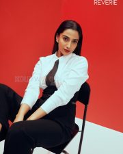 Striking Actress Meenakshi Chaudhary in a White puff shoulder blouse with black necktie waistcoat and wide leg trousers Photos 03 Striking Actress Meenakshi Chaudhary in a White puff shoulder blouse with black necktie waistcoat and wide leg trousers Photos 03