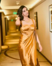 Stunning Glamour Beauty Meenakshi Chaudhary in a Golden Maxi Dress Photos 01