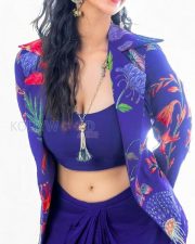 Stunning Meenakshi Chaudhary in a Vibrant Blue Bralette with Matching Skirt and a Stylish Shrug Photos 03