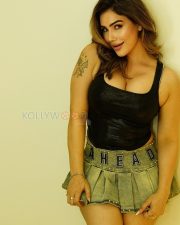 Sultry Kangna Sharma Cleavage in a Black croc print crop top and olive studded mini skirt Photos 03