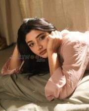 Winsome Actress Mirnaa Menon in a Pink Oversized Shirt Dress Photos 02