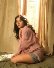 Winsome Actress Mirnaa Menon in a Pink Oversized Shirt Dress Photos 03