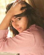Winsome Actress Mirnaa Menon in a Pink Oversized Shirt Dress Photos 04