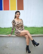 Actress Ashu Reddy Glam in a Beige Floral Printed Mini Bodycon Dress with Black Boots Photos 01