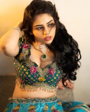 Radiant Actress Bandhavi Sridhar in a Teal Floral Embroidered Lehenga Photos 02