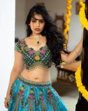 Radiant Actress Bandhavi Sridhar in a Teal Floral Embroidered Lehenga Photos 06