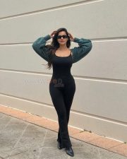 Stylish Ashu Reddy in a Skin Tight Black Dress Photos 04
