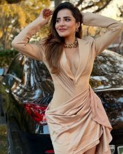 Trimukha Actress Ashu Reddy in a Peach Satin Wrap Dress Photos 02 Trimukha Actress Ashu Reddy in a Peach Satin Wrap Dress Photos 02