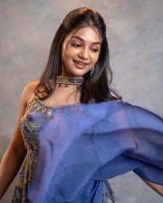 Cute Actress Ivana in a Printed Sleeveless Top with a Blue Skirt Photos 01