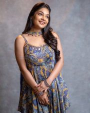 Cute Actress Ivana in a Printed Sleeveless Top with a Blue Skirt Photos 02