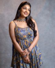 Cute Actress Ivana in a Printed Sleeveless Top with a Blue Skirt Photos 02