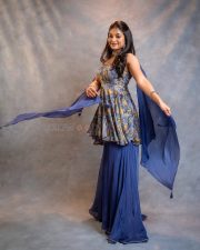 Cute Actress Ivana in a Printed Sleeveless Top with a Blue Skirt Photos 03