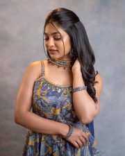 Cute Actress Ivana in a Printed Sleeveless Top with a Blue Skirt Photos 04
