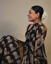 Actress Ahaana Krishna in a Black Printed Saree with a Sleeveless Black Blouse Photos 02