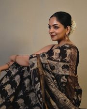 Actress Ahaana Krishna in a Black Printed Saree with a Sleeveless Black Blouse Photos 05