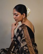 Actress Ahaana Krishna in a Black Printed Saree with a Sleeveless Black Blouse Photos 07
